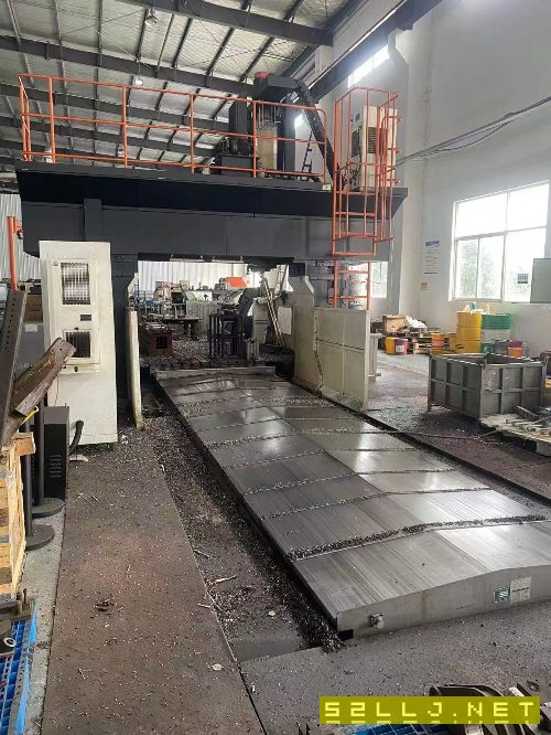 紐威6028龍門，工作臺6x2米，三軸行程6200x3200x1000，門寬2.8米，門高1.65.