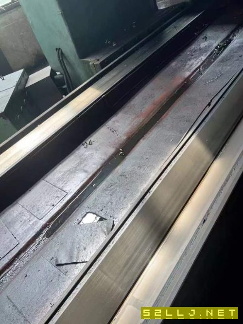 青島重型2.58米龍門刨銑，工作臺尺寸:2200，過寬:2500.