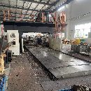 紐威6028龍門，工作臺6x2米，三軸行程6200x3200x1000，門寬2.8米.