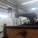 湖南工廠剛剛買下國(guó)盛4027龍門一臺(tái)，工作臺(tái)2米4米，門.