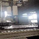 湖南工廠剛剛買下國(guó)盛4027龍門一臺(tái)，工作臺(tái)2米4米，門.