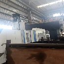 湖南工廠剛剛買下國盛4027龍門一臺，工作臺2米4米，門.